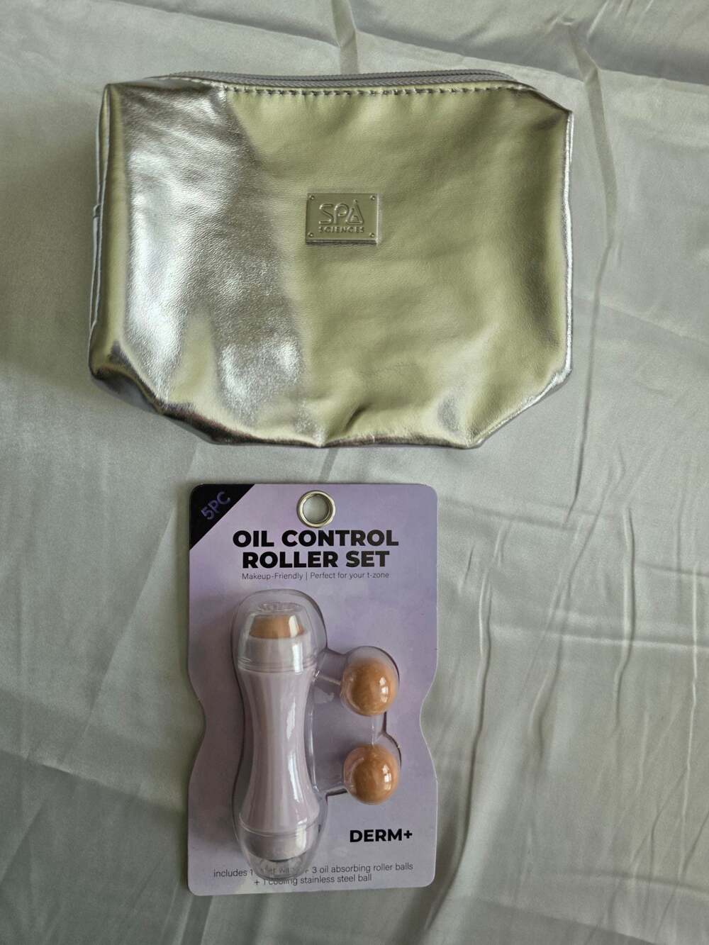 Spa Sciences Metallic Silver Cosmetic Bag and Derm+ Oil Control Roller Set